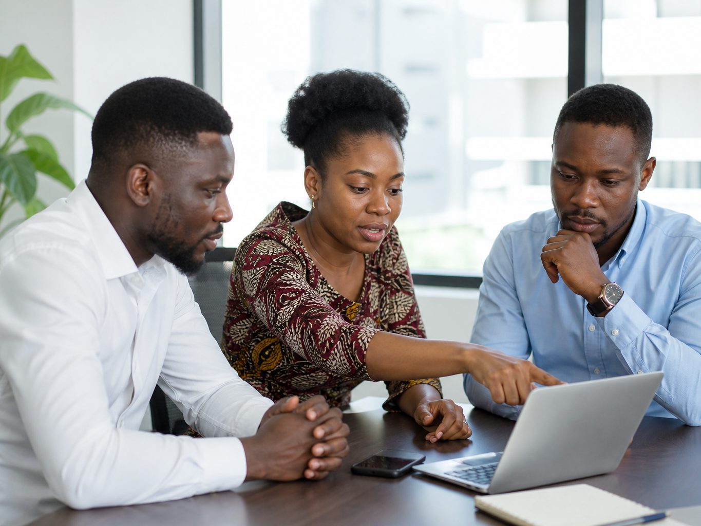 Ghanaian professionals collaborating in Accra